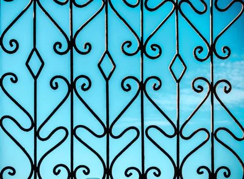 A grid on a window Stock Photos