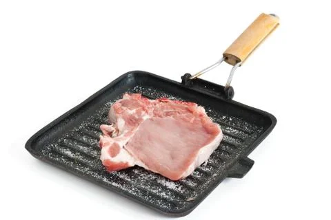 Griddle with raw pork Stock Photos