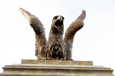 Griffin in front on light background, selective focus Stock Photos