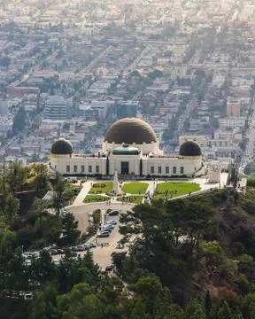 Griffith Observatory with cityscape in backdrop at sunset Stock Photos