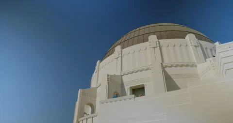 Griffith Observatory dome against blue sky in Los Angeles Stock Footage 342728850