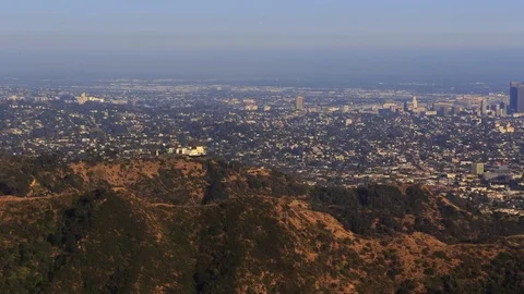 Griffith Observatory Handheld shot with a Los Angeles Skyline background Stock Footage 76547100