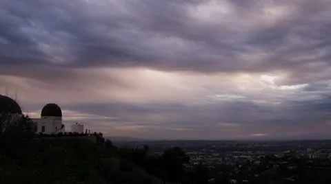 Griffith Park Observatory Dramatic Stormy Sky pan to Hollywood sign Video stock 10571541