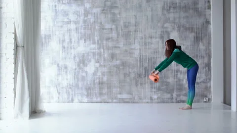 Gril putting the mat on the floor Stock Footage 104001830