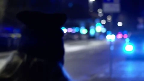 A gril walking no a cold night, with cap towards a car Stock Footage 85066753