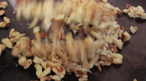Grill and flip spaetzle Stock-Footage 68796670