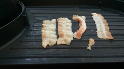 Grill bacon on teflon pan, Timelapse Stock Footage 51518345
