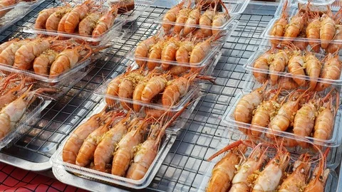 Grill BBQ Shrimp and Prawn on plate at street food Thailand Stock-Footage 101448631
