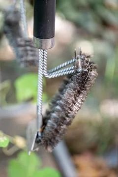 Grill brush with blurred background Stock Photos