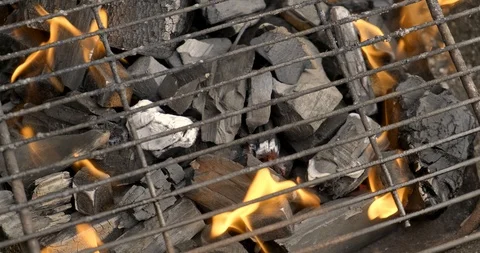 Grill charcoal burning with an open flame isolated Stock Footage 105969270