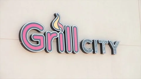 Grill city writing caption text illustrated animated sign on light beige wall Stock Footage 249756988
