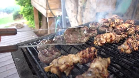 Grill cooking of meat in slow motion Stock Footage 62832993