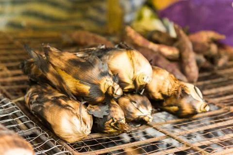 Grill corn by place on a rack and grill on charcoal grills Stock Photos