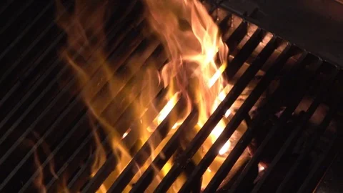Grill fire slow motion Stock Footage 77583894