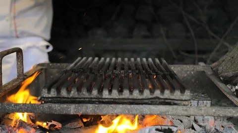 Grill flame, hot burning grill. Sparks grill slow motion Stock Footage 125821338