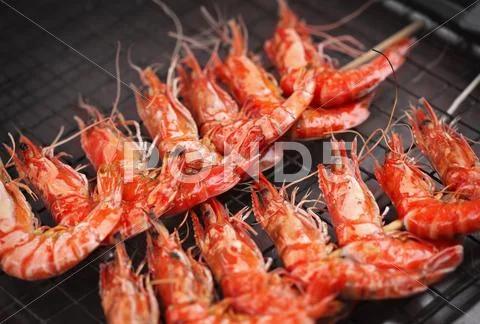 Grill fried prawns Stock Photos
