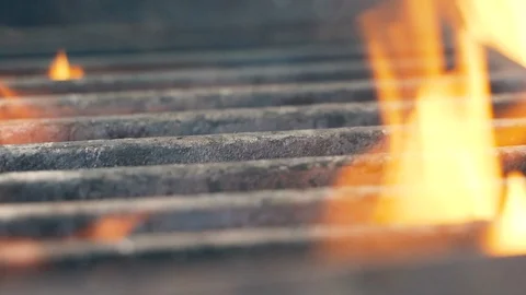 Grill in the kitchen of the restaurant, flame seeps through the grill 스톡 동영상 107768385