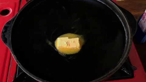 Grill margarine in hot pan preparing for cooking. Stock Footage 86643673