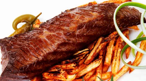 Grill meat on potato chips Stock Footage
