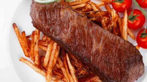 Grill meat on potato chips 스톡 동영상 57629139