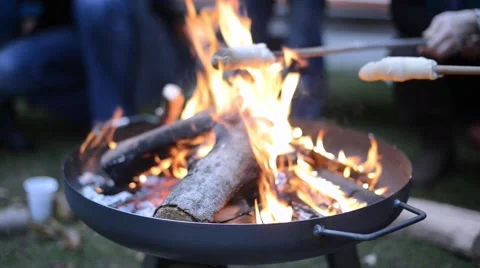 Grill pan with bread on a stick Stock Footage 44443695