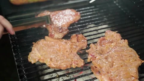 From Grill to Plate: The Mesmerizing Creation of Grilled Pork Belly for Com Tam. Stock-Footage 252865361