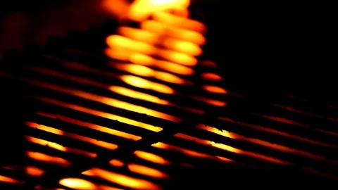 Grill Silhouetted above Open Flame Stock Footage 122003693