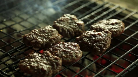 Grill with sizzling meatballs Stock Footage 65481347