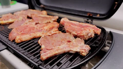 Grill steaks on barbecue close up Video stock 290196097