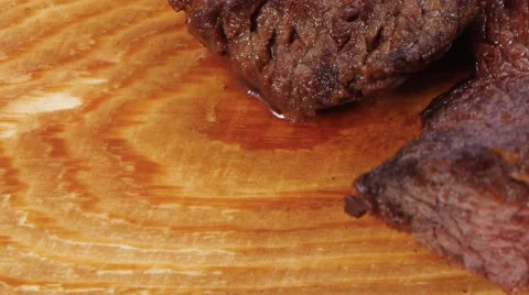 Grilled and raw beef steak fillet meat with knife Stock Footage 54537353