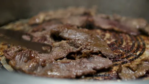Grilled bacon strips capture essence of sizzling goodness, ready to be devoured Stock Footage 302091278