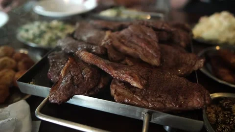 Grilled barbecue beef steak upon the grill. Luxury restaurant. Stock Footage 138855159