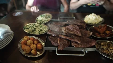 Grilled barbecue beef steak upon the grill. Luxury restaurant. Stock Footage 138855165