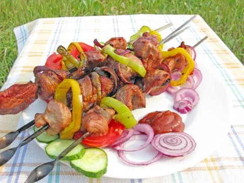Grilled barbecue meat with vegetables Stock Photos