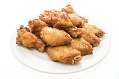 Grilled bbq chicken wing in white plate Stock Photos