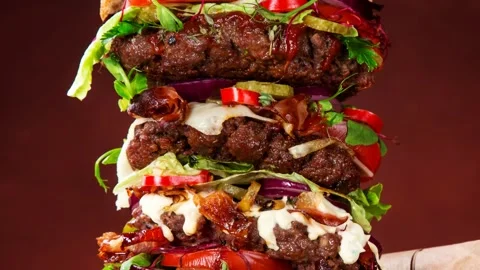 Grilled Beef Burger with Melted Cheese and Fresh Vegetables. Unhealth Video stock 237461327