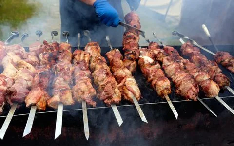 Grilled beef cabobs close-up on an open fire. Stock Photos