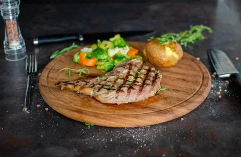 Grilled beef fillet with boiled fresh vegetables and potato. 스톡 사진