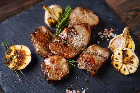 Grilled beef with potatoes and vegetable salad Stock Photos