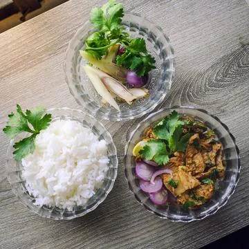Grilled Beef Salad on Table Ready to eat rice. Stock Photos