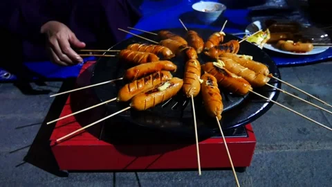 GRILLED BEEF SAUSAGE Stock Footage 228835371
