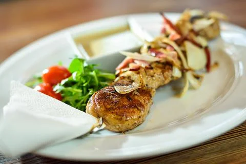 Grilled beef shishkabobs on table close up Stock Photos