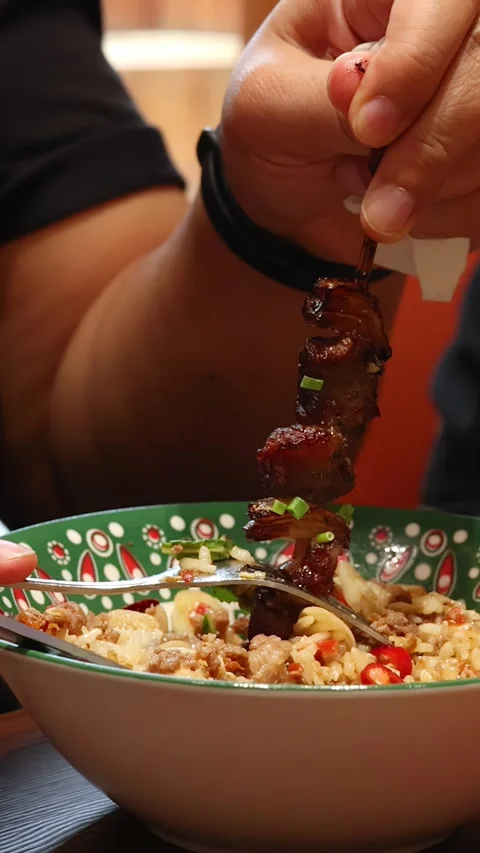 Grilled Beef Skewer Served Over Rice in Colorful Bowl Stock Footage 315426556