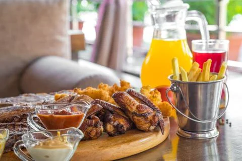 Grilled beef steak and Assorted delicious grilled meat with french fries and Stock Photos