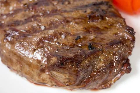 Grilled beef steak closeup. Stock Photos