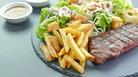 Grilled beef steak with fresh vegetable Stock Footage 149457073