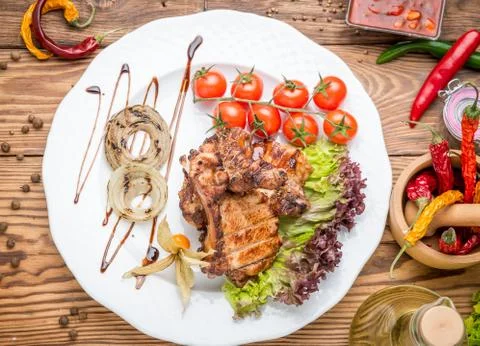Grilled beef steak on the grill Stock Photos