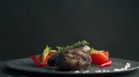 Grilled Beef Steak Meat with Vegetables rotating Video stock 67169110