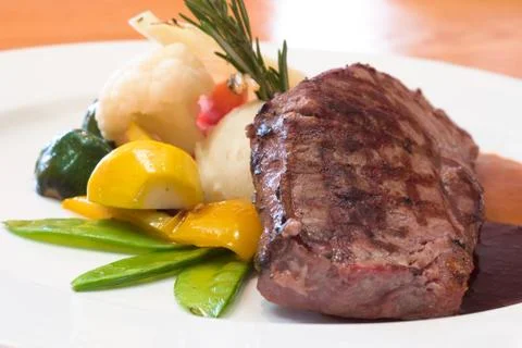 Grilled beef steaks Stock Photos