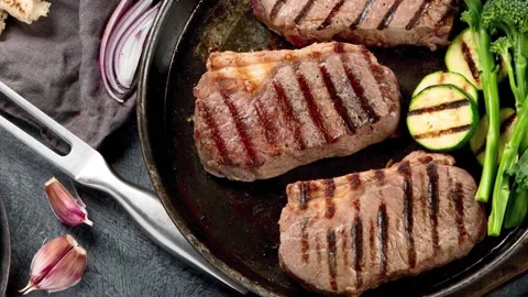 Grilled beef steaks, top view Stock Footage 198832480